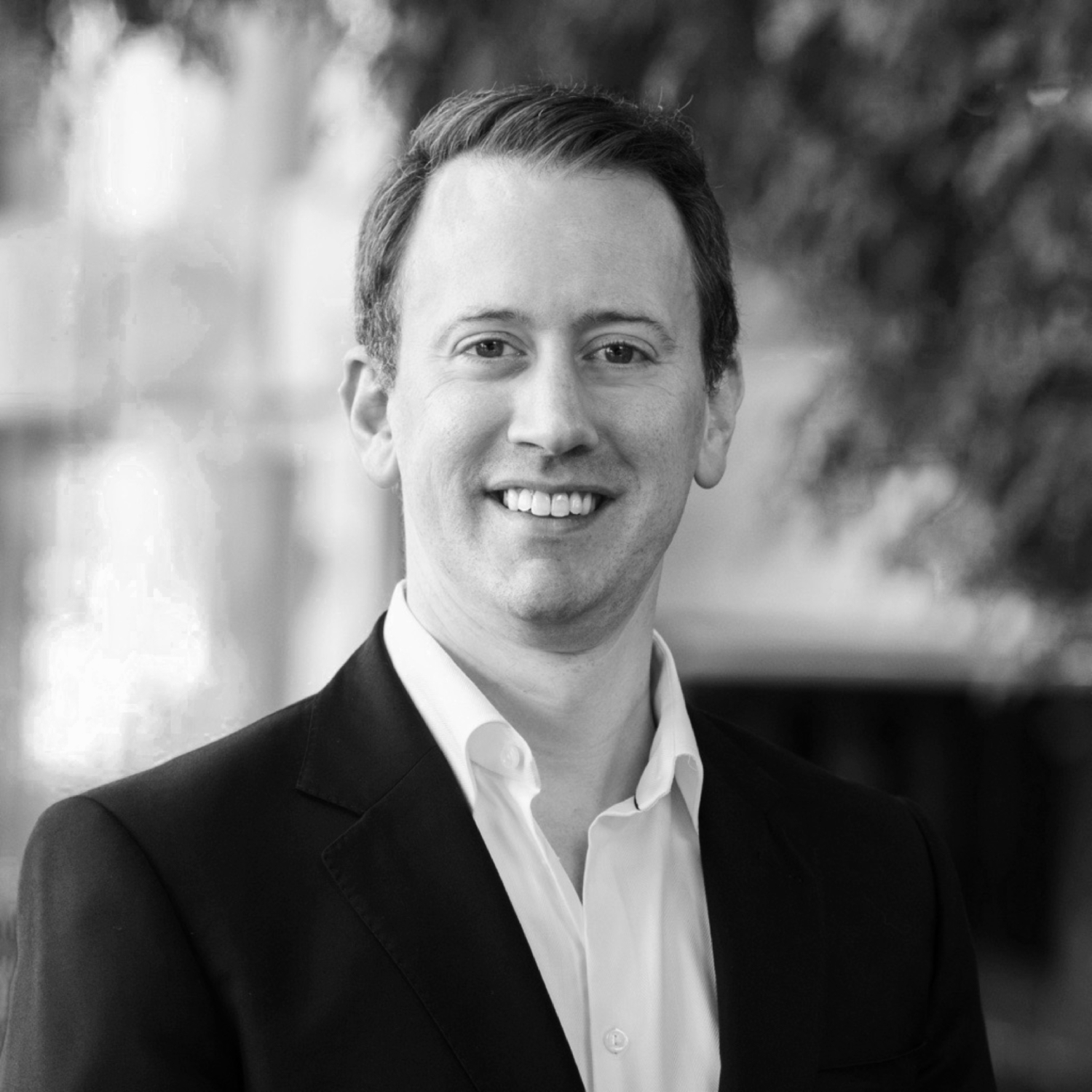 Black and white formal headshot of William Yea.