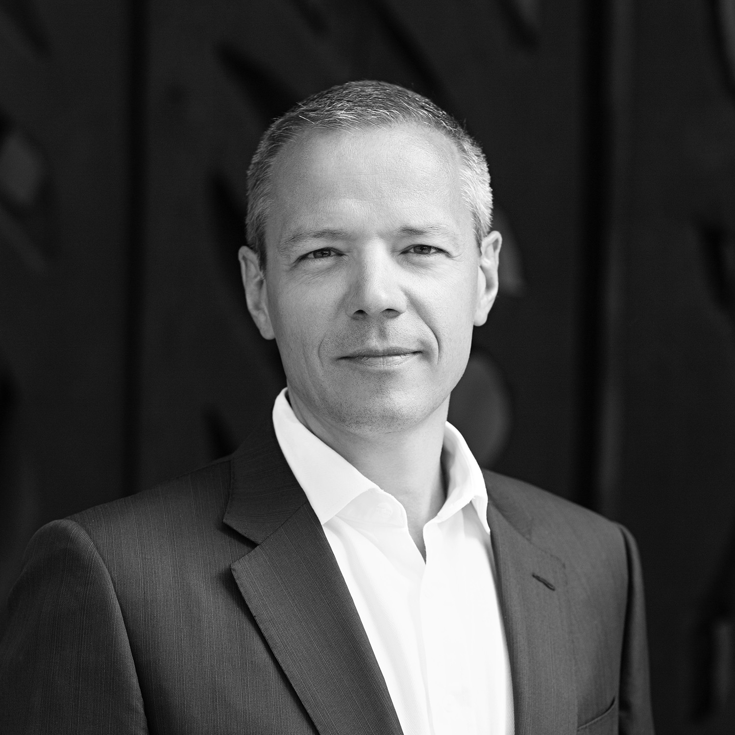 Black and white formal headshot of Francois Aguerre.