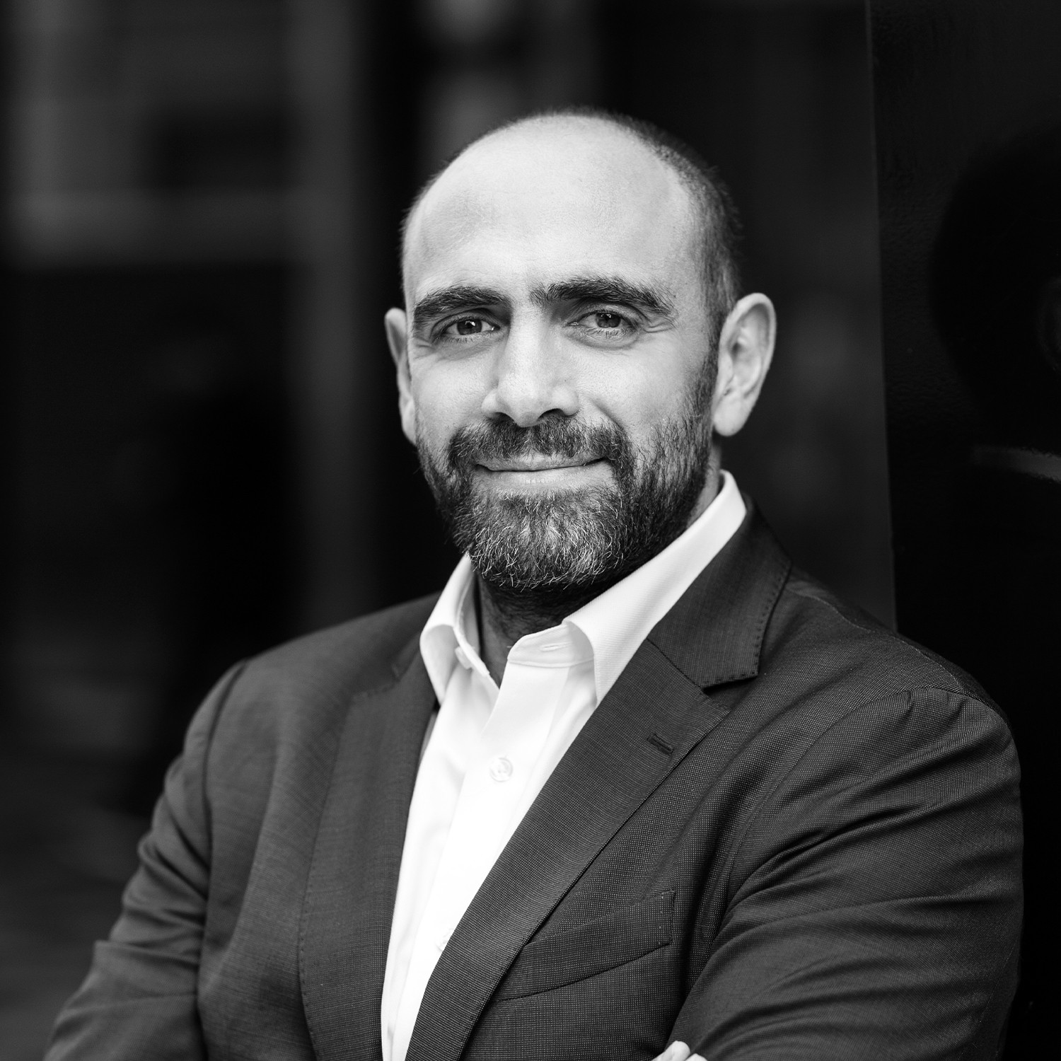 Black and white formal headshot of Hani El Khoury