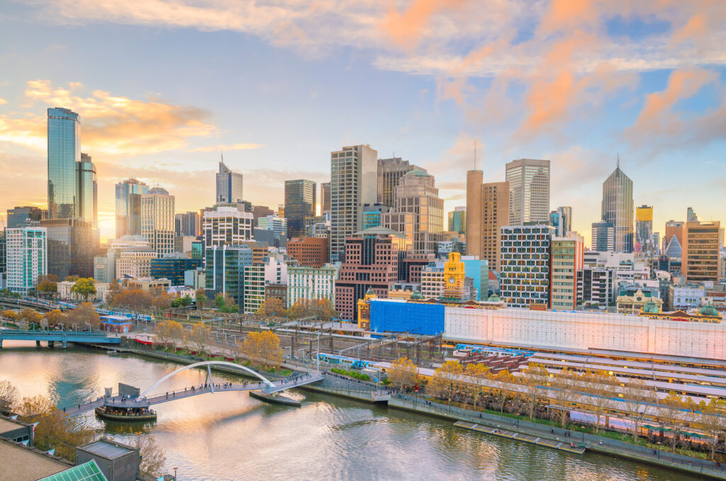 Sunrise over Melbourne's skyline and the Yarra river.