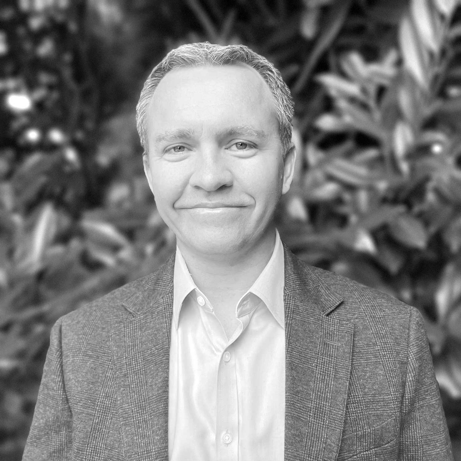 Black and white formal headshot of Matt McCann.