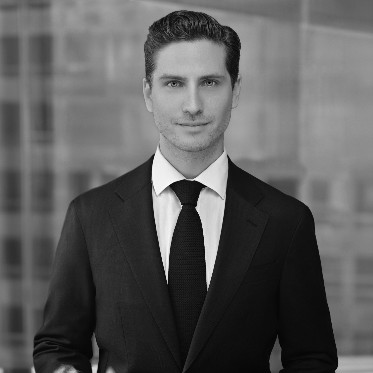 Black and white formal headshot of Daniel Cohen.